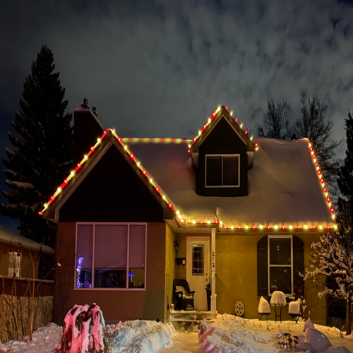 small home with simple holiday lighting installation