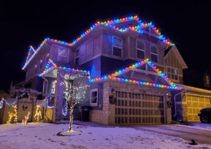 house with mulicolour holiday lighting theme
